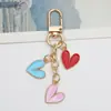 Amazon Nuevo Colgante de Amor Llavero Colgante Chica Dulce Lindo Aleación de Goteo de Aceite Llavero Accesorios para Bolsos