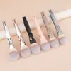 Venta directa de fábrica 4 en 1 pincel de maquillaje magnético, pincel de polvos portátil, pincel para sombras de ojos, herramienta de belleza de cerdas suaves, producto popular de exportación