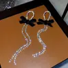 Brincos de argola com agulha de prata 925 e borla longa, design de laço de alta qualidade, brincos com incrustação de diamante, brincos de corrente, brincos para mulheres