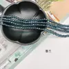 Contas de roda de cristal Xingtai transfronteiriças, acessórios de joias faça você mesmo, contas recortadas em vidro, fivela de cabeça, acessórios de roupas, contas planas de cristal