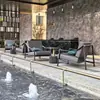 Sillón de sofá para exteriores para patio y áreas residenciales, asiento de ocio combinado impermeable y a prueba de sol de aleación de aluminio, mesa y silla de muebles de exterior