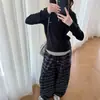 Calça Xadrez Casual para Meninas Outono 2026 Nova Estilosa Solta para Crianças Médias e Grandes Tendência Cool Moda Cargo Cropped Tendência