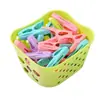 Paquete de 30 pinzas pequeñas de plástico con una cesta de almacenamiento, usadas para colgar ropa, pinzas a prueba de viento para ropa interior y calcetines, pinzas para secar