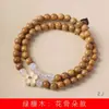 Sándalo verde DIY pulsera de flores y flores de hueso especificaciones 0.6 hombres y mujeres juego literario nacional cuentas decorativas fabricantes de joyería venta al por mayor