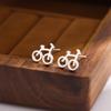 Moda simple creativa personalidad bicicleta Joker aretes mujer venta al por mayor