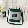 Bolso bandolera pequeño cuadrado de lona con bloques de color, moderno y versátil, para mujer, para teléfono móvil y monedas, portátil para el día a día, venta al por mayor