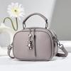 Bolsa de Mamá Transfronteriza Modelo Nuevo 2026 con Colgante de Oso, Bolso de Mano para Mujer, Bolso Cruzado de Hombro Casual Simple y Elegante