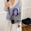 Bolso de mujer vintage de alta gama y nicho, nuevo y moderno bolso de hombro de moda 2026, bolso cruzado tipo cubo versátil
