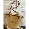 Bolso de mano tejido transfronterizo, bolso de mano ligero de lujo para la playa y el mar, bolso de hombro individual de paja de gran capacidad con pliegues y letras de moda