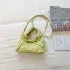 Bolsa feminina minimalista de nicho estilo coreano, modelo 2026, bolsa transversal fashion, alto apelo estético, bolsa de mão casual tendência, bolsa de bolinho