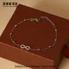 Pulsera Versátil de Acero Inoxidable con Figura de Infinito Ocho y Circonita al por Mayor para Mujeres, Lujo Ligero, Sensación de Alta Gama, Joyería de Acero de Titanio que no se Desvanece