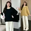 Roupa de maternidade outono e inverno nova cor bloco gola suéter solto cobre barriga cúrcuma preto estilo preguiçoso top de tricô peça única
