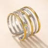 Anillo de Acero Inoxidable de Comercio Exterior Transfronterizo, Anillo de Línea Chapado en Oro Prensado con Aceite, Diseño de Nicho para Mujer, Fábrica de Joyería de Acero de Titanio que No se Desvanece