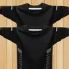 Camiseta de manga larga para hombre, nueva colección primavera/otoño 2026, capa base elástica, top de cuello redondo, versátil y moderno