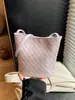 Bolso cubo de moda transfronterizo para mujer, nuevo modelo primavera 2026, bolso de hombro de nicho de alta gama, bolso cruzado versátil