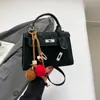 Nova Bolsa Kelly Suede Fosco Outono e Inverno 2025 Nova Bolsa de Mão Fashion Versátil Pequena de Ombro Transversal para Mulheres
