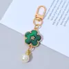Estilo Ins Colgante de Llavero con Colgante de Flor de Perla Multicolor de Doble Cara Colgante Creativo para Bolso de Mujer Venta Caliente Transfronteriza