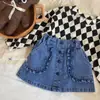 Saia Jeans Versátil com Renda Estilo Coreano Nova Primavera/Verão com Bolso de Renda Saia Jeans Meia-Saia Infantil Jeans Nova 2026