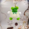 Bolsita de briquetas pequeñas con colgante de muñeca de imitación de pelo de conejo rex, colgante de muñeca de dibujos animados, llavero de coche, al por mayor