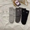 Estilo Coreano Estilo Ins Tacón Bordado Dibujo Animado Cachorro Letras Ab Pie Izquierdo y Derecho Asimétrico Calcetines de Media Pantorrilla Calcetines de Felpa