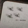 Arte de Uñas Transfronterizo Ultra Brillante Circonita Lazo Plateado Decoración de Uñas Celebridad de Internet Popular Venta Caliente Mariposa Pequeña Accesorios para Uñas Al por Mayor