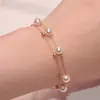Pulsera de perlas de doble capa elegante popular transfronteriza europea y americana, pulsera de cuentas doradas de diseño simple de alta gama de moda