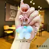 Chaveiro Estrela Rosa e Coelho da Lua Preenchido com Óleo, Chaveiro de Garrafa com Areia Líquida Estilosa Lua Pingente, Decoração para Mochila de Casal Venda por Atacado