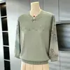 Blusa de Mamá Estilo Nuevo 2026 Colección Primavera Cuello Alto Moda para Mujeres de Mediana Edad Camiseta de Manga Larga Superior para Personas de 50 Años