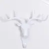 Gancho creativo para guardar llaves de puerta, diseño de cabeza de ciervo sin taladro, nuevo gancho fuerte estilo ins para abrigos y sombreros para detrás de la puerta en el dormitorio