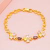 Moda cobre banhado a ouro cor zircônia Trevo feminino pulseira fábrica direta imitação cristal pulseira ouro areia presente atacado