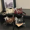 Bolso de mano con cadena de patrón de rombos para mujer, nuevo bolso cruzado de moda temporada otoño 2026, bolso de hombro, bolso de axila, bolso tipo dumpling