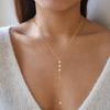 Collar transfronterizo europeo y americano simple geométrico retro en forma de Y diseño nicho nuevo colgante de circonita cadena clavicular de cuentas de arroz