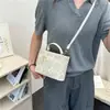 Bolsa de mão texturizada de alta qualidade para mulheres no atacado, novo modelo de verão 2026, bolsa de ombro estampada simples, bolsa transversal para o dia a dia