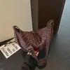 Bolso bandolera de gran capacidad y estilo para mujer, perfecto para el trabajo y los desplazamientos en otoño e invierno, nueva colección 2026, con estampado de leopardo y diseño de color liso con cierre de cremallera