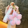 Lindo llavero de flor de tela accesorios creativos para bolso llavero de coche colgante para agarrar regalo pequeño venta al por mayor