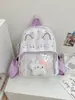 Mochila de Gatito con Lunares de Dibujos Animados para Mujer Diseño de Nicho Dulce y Linda Bolso Escolar a Cuadros Mochila Pequeña Nueva 2026