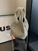 Bolso de mano con tachuelas de diamantes transfronterizo para mujer, nuevo bolso tipo cubo retro francés 2026, bolso de hombro casual de alta gama