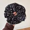 Diadema Floral Retro para Mujer 2025 Nuevo Estilo Cuerda para Cola de Caballo Alta con Cabeza de Bola Flor en la Parte Posterior de la Cabeza
