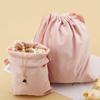 Bolsa de franela de alta calidad al por mayor, bolsa de franela para regalo de vino tinto de fondo redondo con borla de flockeo explosivo