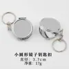 Llavero de Metal con Forma de Corazón DIY Espejo Pequeño Colgante con Logo de Resina Accesorios DIY Espejo de Maquillaje Mini Portátil