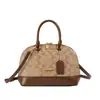 Bolso de Hombro Vintage Nueva Moda Otoño/Invierno 2026 para Mujer con Monograma Bolso Versátil Estilo Europeo y Americano Forma de Concha Personalidad Única