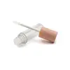 Suministro de fábrica tubo vacío de brillo labial de plástico material de empaque de brillo labial de maquillaje 2.5-4mL inyección tubo redondo transparente de brillo labial