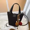 Bolso de mano estilo retro para mujer, nueva colección 2026, moderno y sofisticado, bolso de hombro popular para el trabajo y los desplazamientos, bolso cruzado tipo cubo
