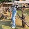 Jeans reto solto feminino de cintura alta 2026 novo primavera e outono cor clara emagrecedor para pessoas baixas calças pantalona compridas até o chão da moda