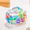 Adornos creativos de botella de aceite líquido de rosa permeable al agua de arena movediza Accesorios de llavero acrílico Colgantes pequeños Regalos al por mayor
