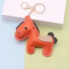 Colgante de poni de cuero pu de moda, colgante de bolsa de dibujos animados de cuero, todo a juego, lindo colgante de bolsa para llave de coche de moda