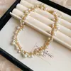 Nuevo Conjunto de Collar Pulsera Pendientes con Borla de Perlas de Nicho para Mujer Moda Lujo Ligero Accesorios de Alta Gama