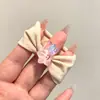 Modernas y coloridas nuevas ligas para el cabello 2026, accesorios versátiles para el cabello inspirados en la dopamina para niños, diademas de alta gama con temática de dulces M&M