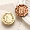 Lançamento de novos produtos: Série floral europeia de 26 letras latão maciço selante para convites de casamento e lembrancinhas de festa