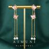 Nuevos pendientes chinos de pipa con flor de durazno rosa, pendientes de alta calidad con un temperamento dulce, diseño de estilo nacional, pendientes geniales.